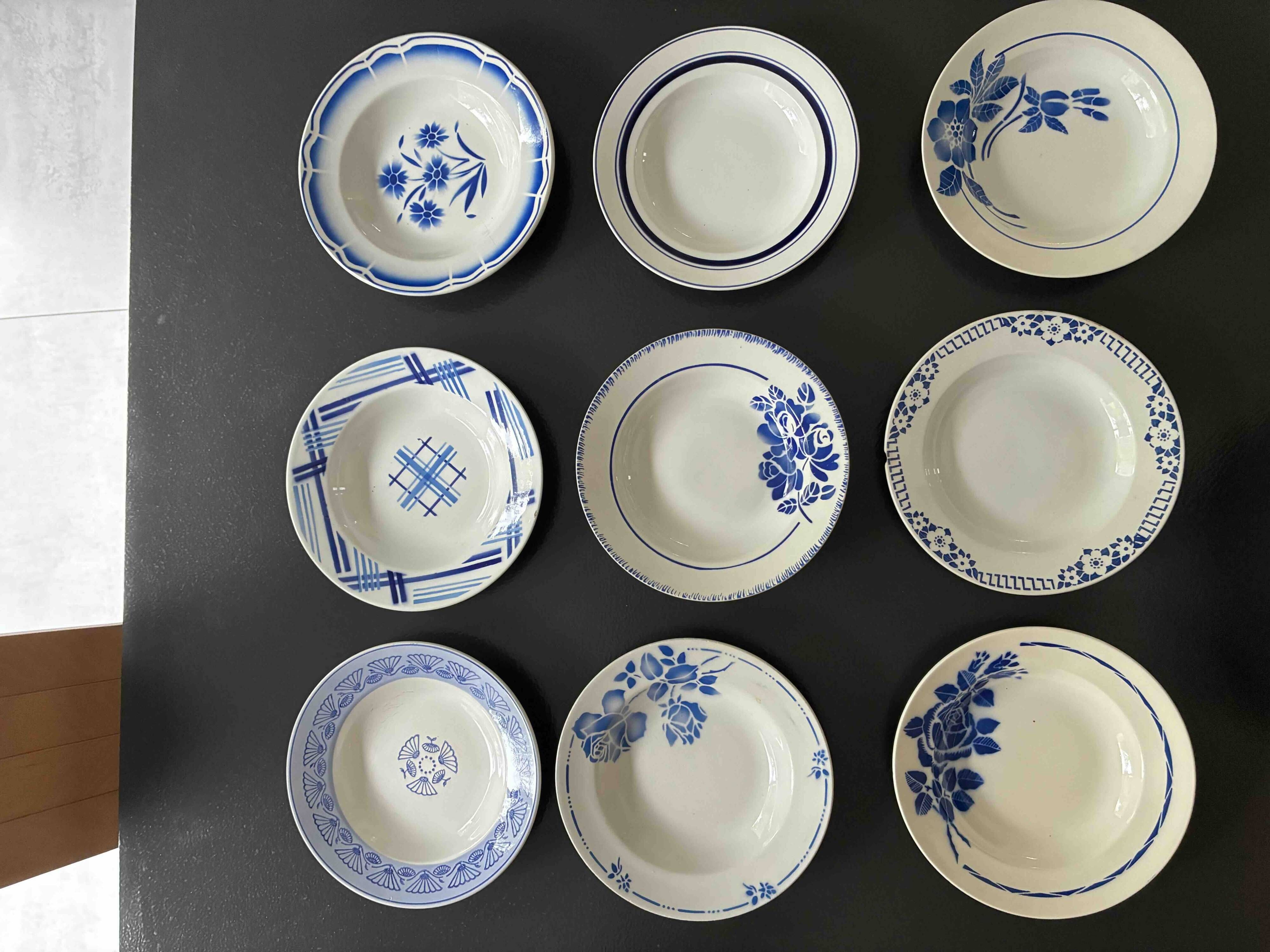 Set of 9 vintage deep plates with blue patterns.