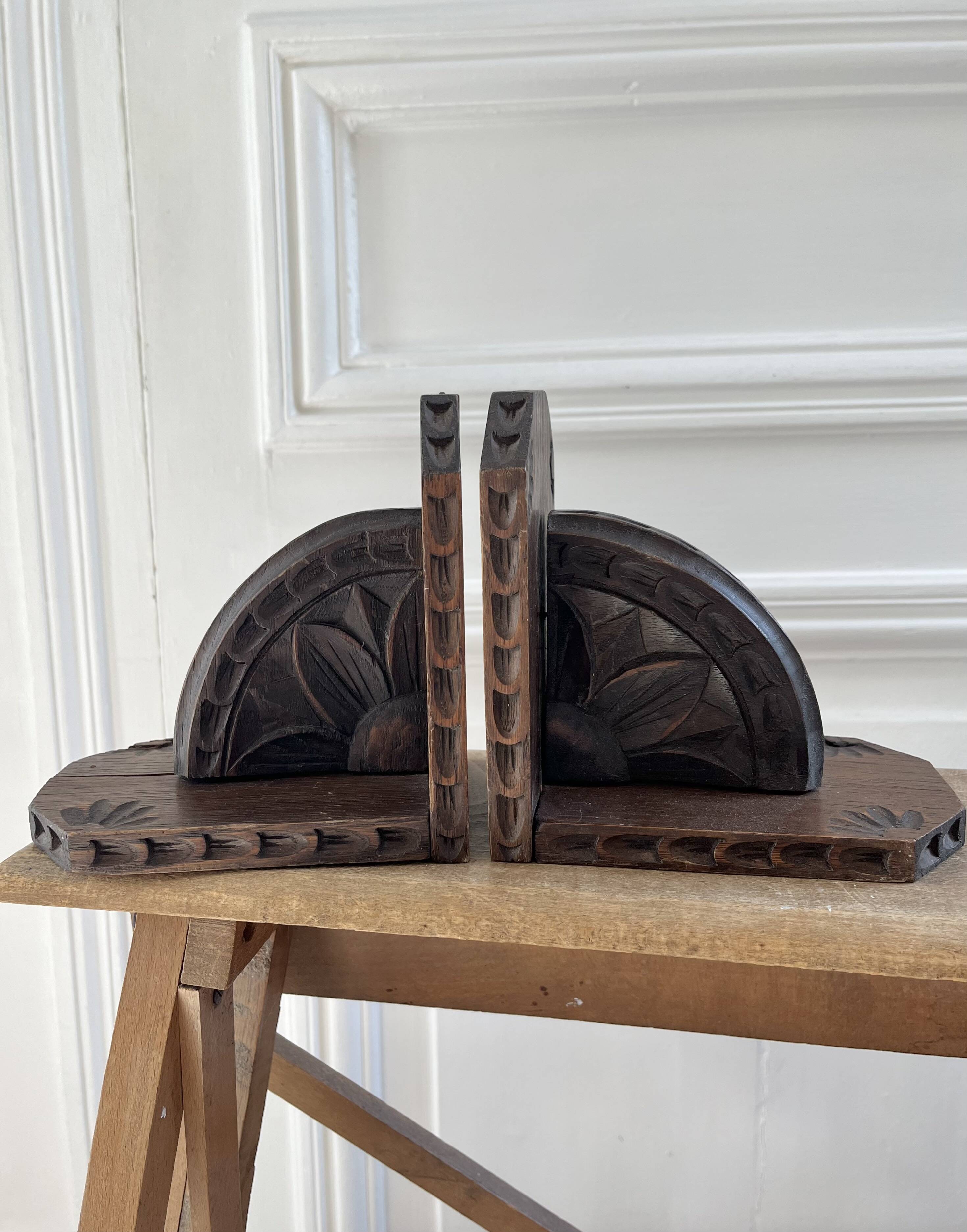 Pair of carved wooden bookends