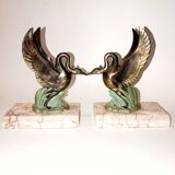 Art Deco bookends with metal swans, double patina and marble base.