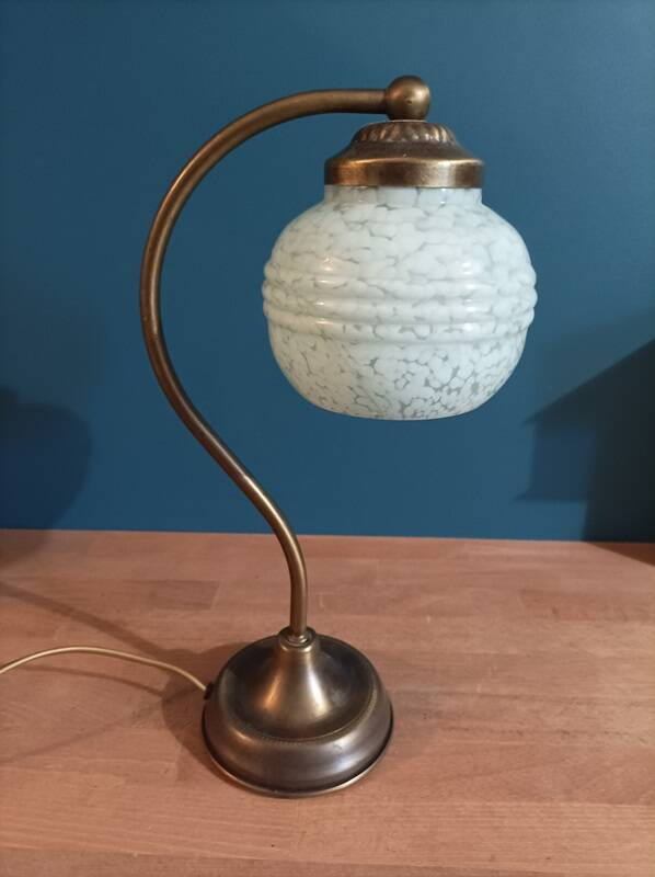 Bedside lamp in room with patinated golden globe Clichy blue