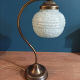 Bedside lamp in room with patinated golden globe Clichy blue