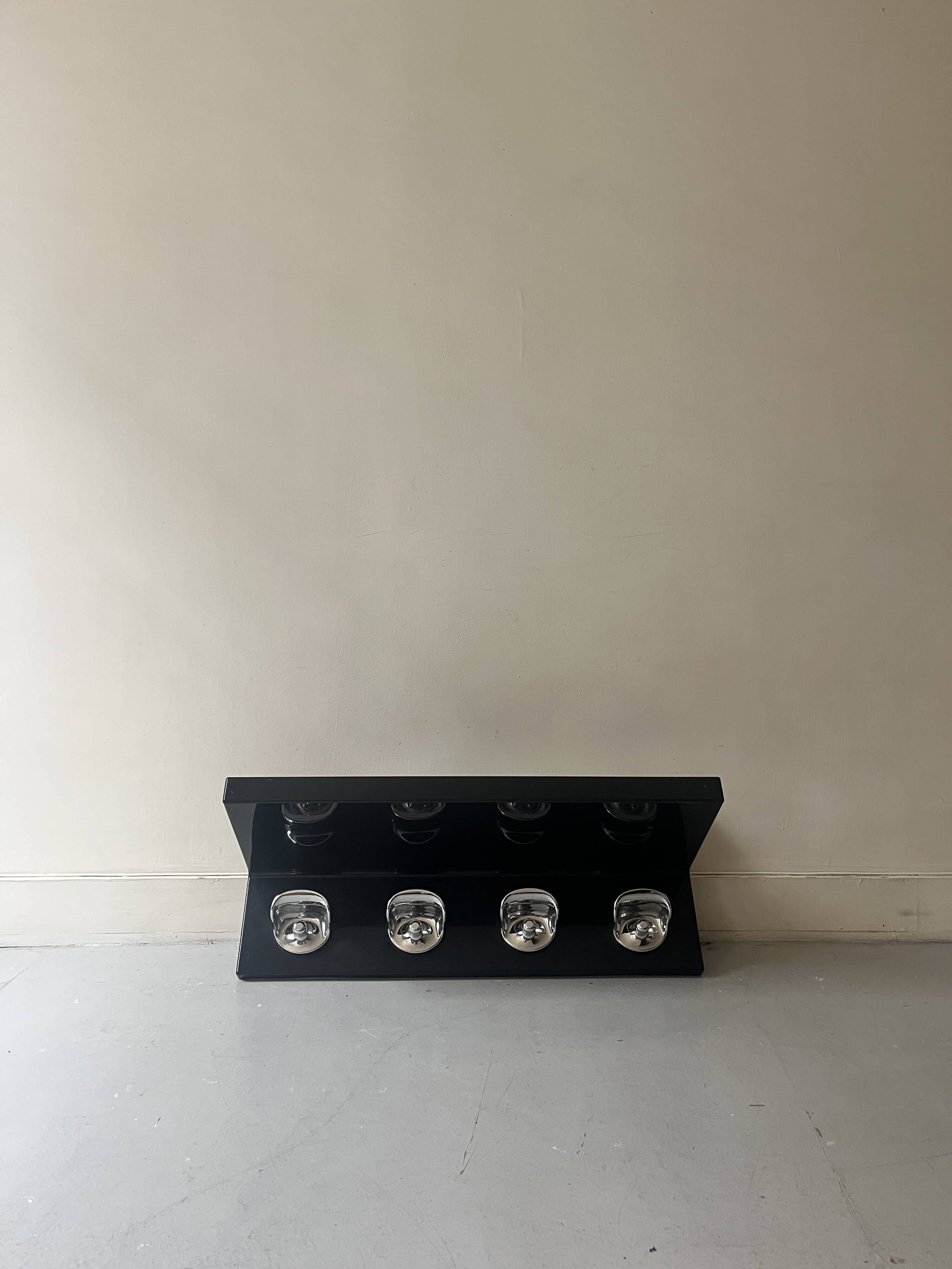 Large black magazine rack by Giotto Stoppino for Kartell, Italy 1970.