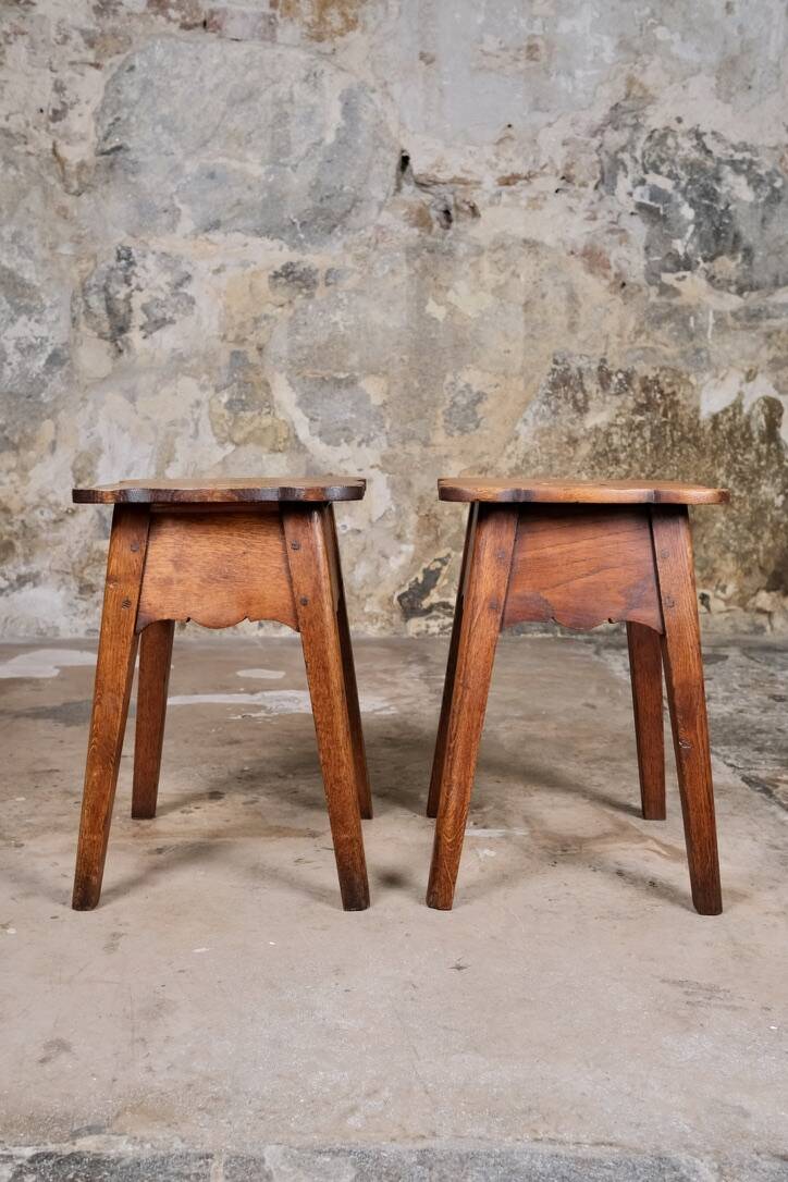 Pair of scalloped oak stools, France, early 20th century