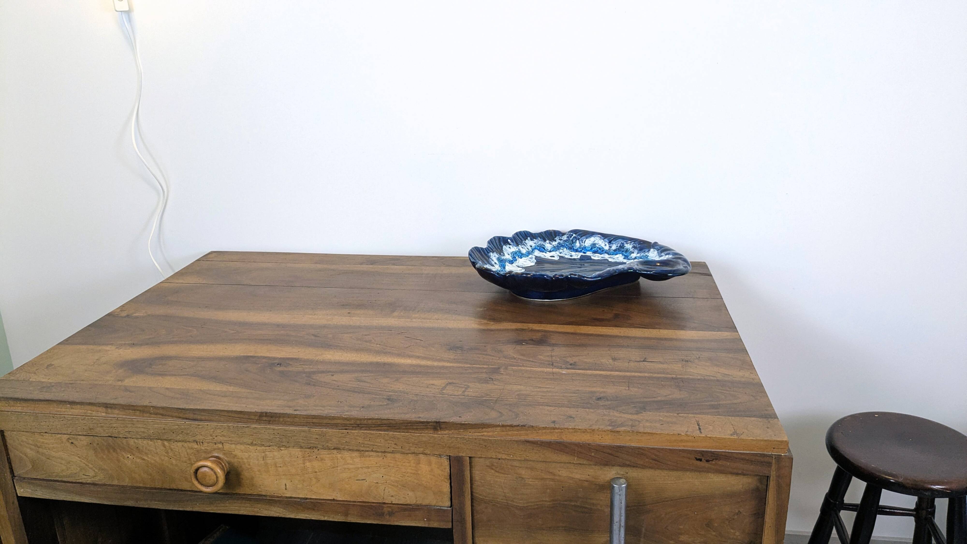Large vintage shell-shaped blue glazed ceramic bowl