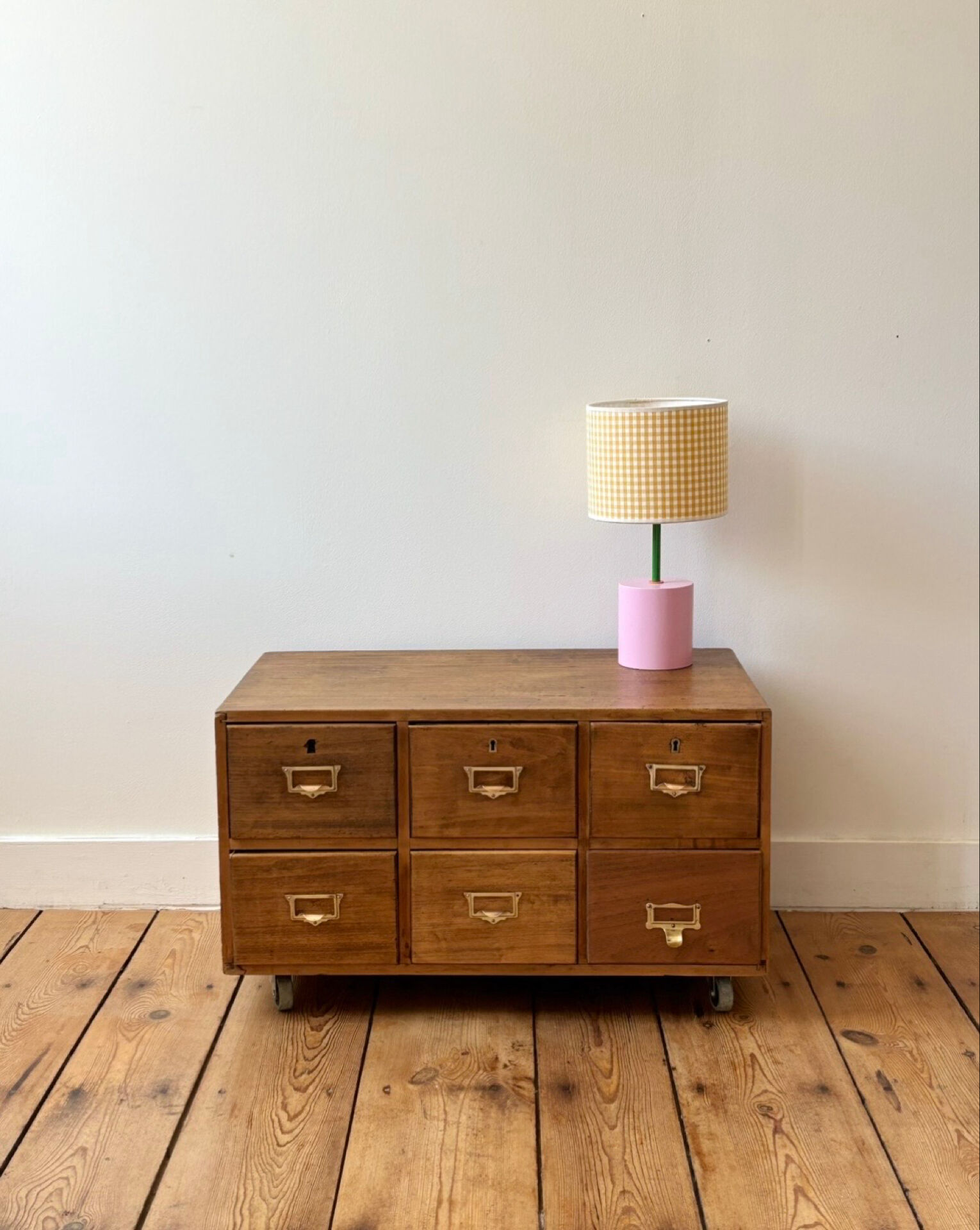 Small antique work cabinet with 6 drawers.