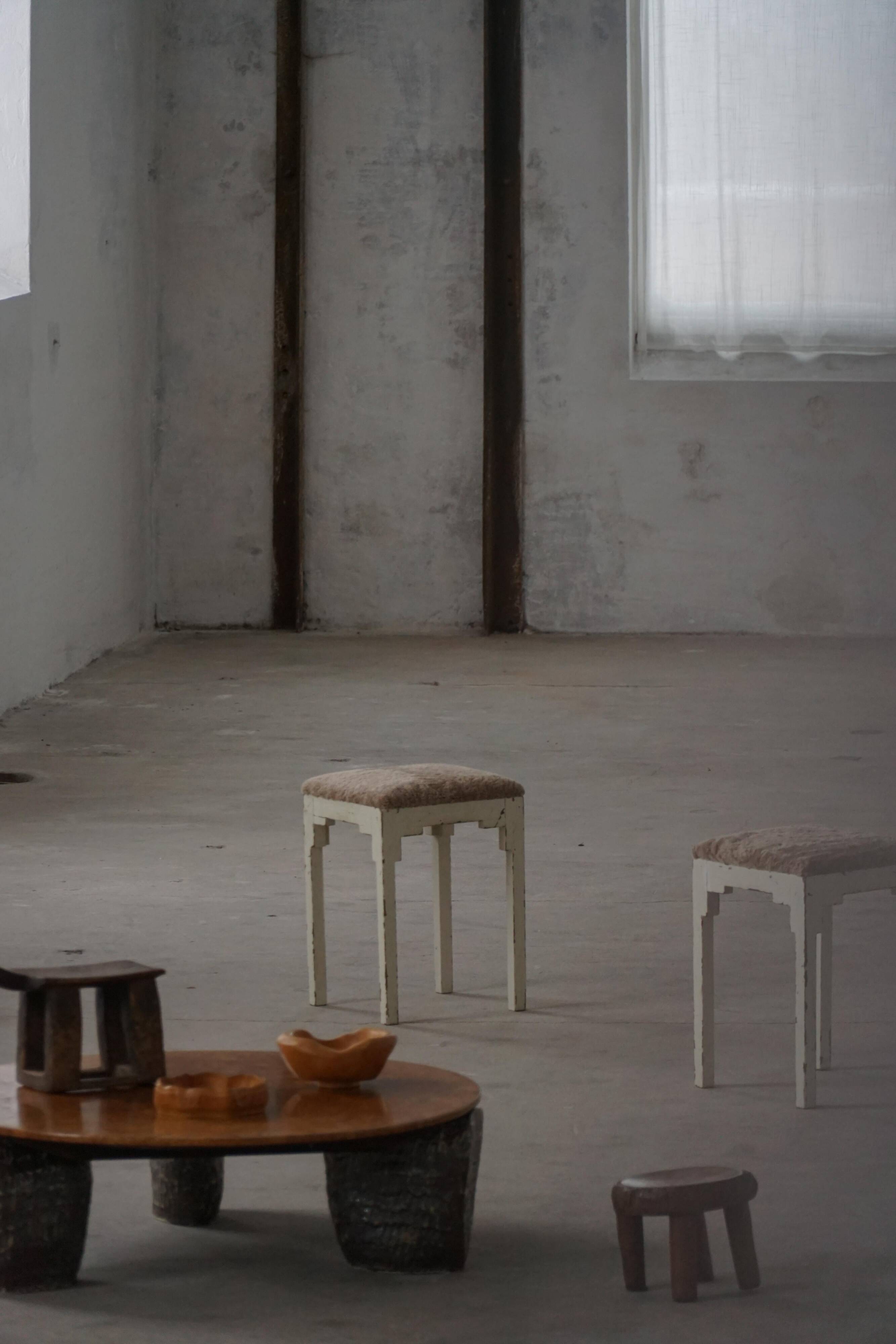 A pair of antique Danish stools, seats in lambswool, late 19th century.