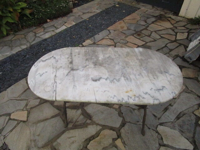 Antique marble bistro table and cast iron foot