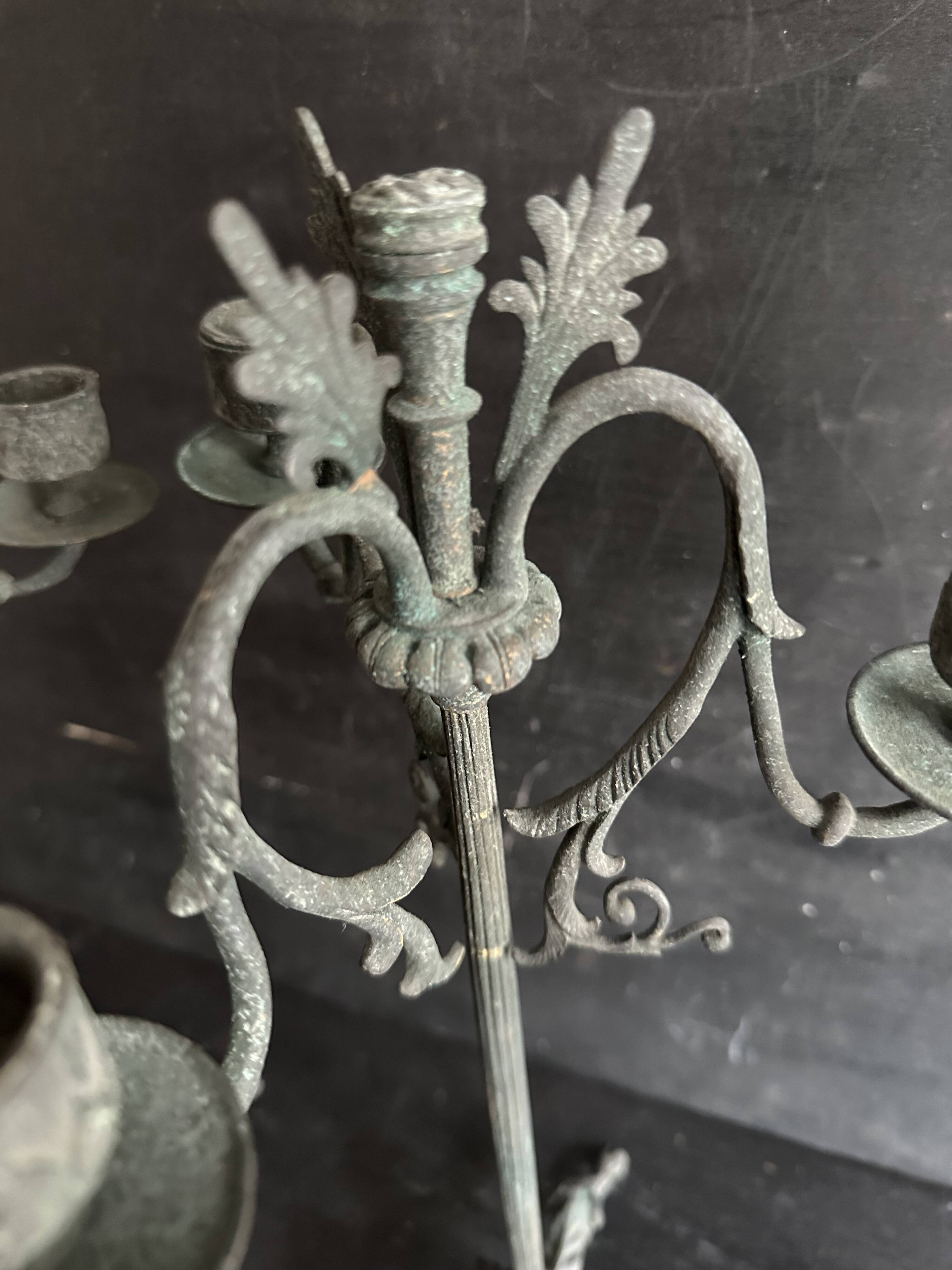 Pair of large Napoleon III candlesticks in patinated bronze