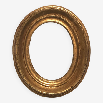 Old oval golden wood frame