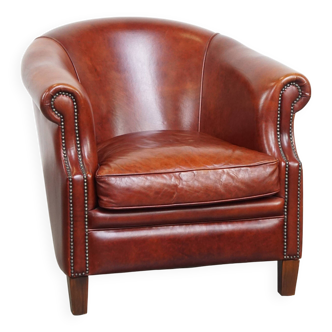 Fauteuil club en cuir de vachette couleur cognac de style anglais
