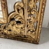 Miroir a pare closes de style Louis XIV en bois et stuc doré XIX siècle
