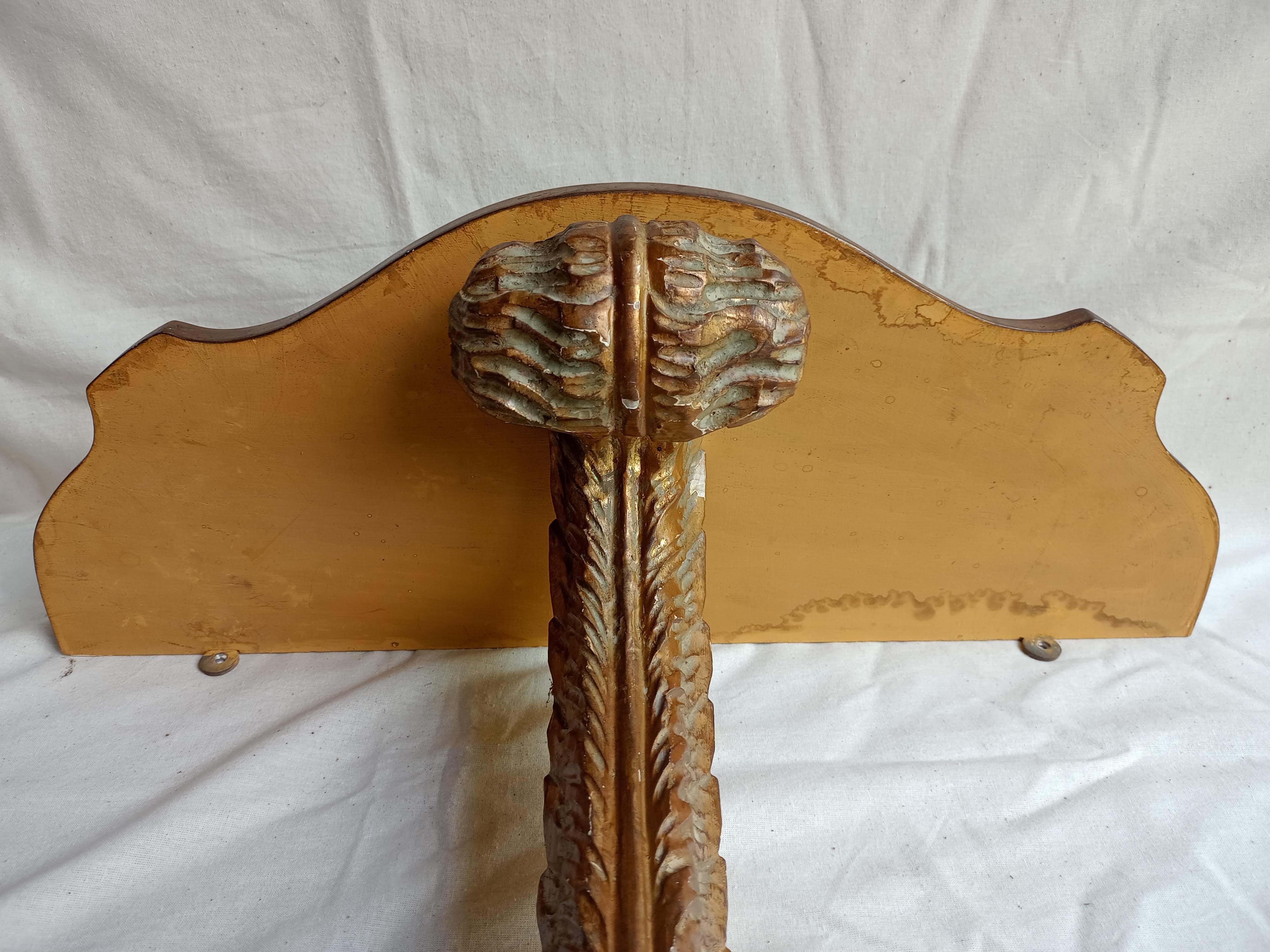 Carved gilded wooden console