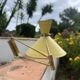 Diabolo wall lamp lunel yellow in the style of René Mathieu Guariche, star sheet metal.