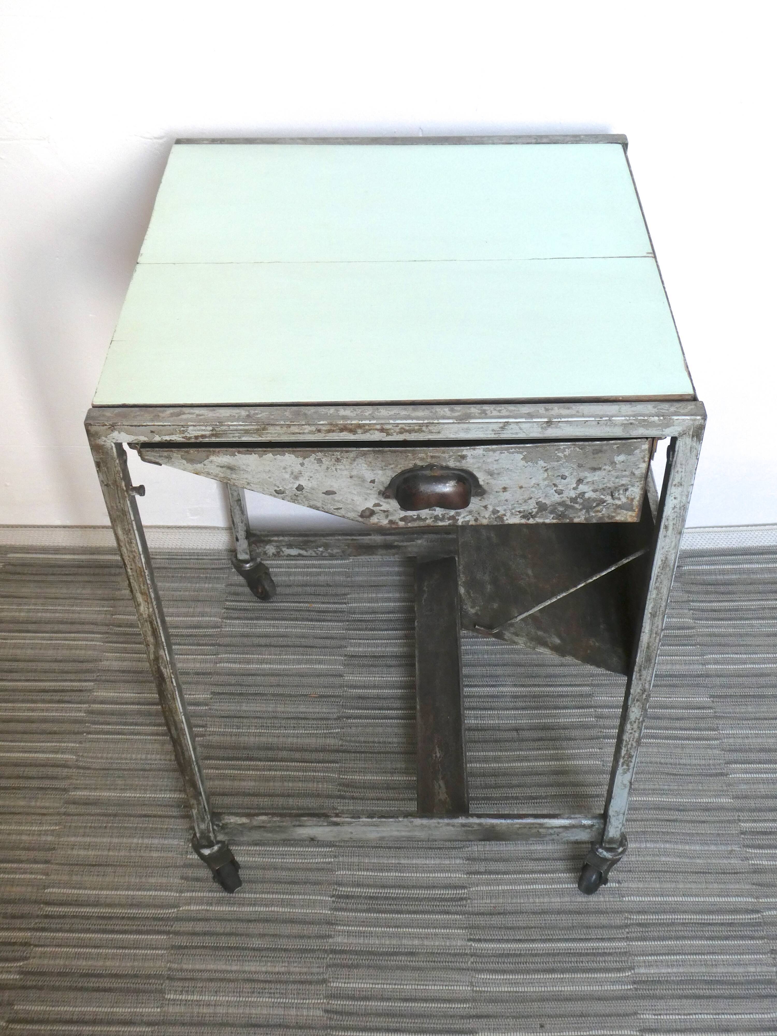 Industrial storage, workshop, in metal and wood, furniture on wheels