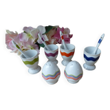 Set of 4 vintage colored egg cups with spoons, salt and pepper shakers