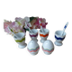 Set of 4 egg cups with spoons, colourful vintage salt and pepper shakers.