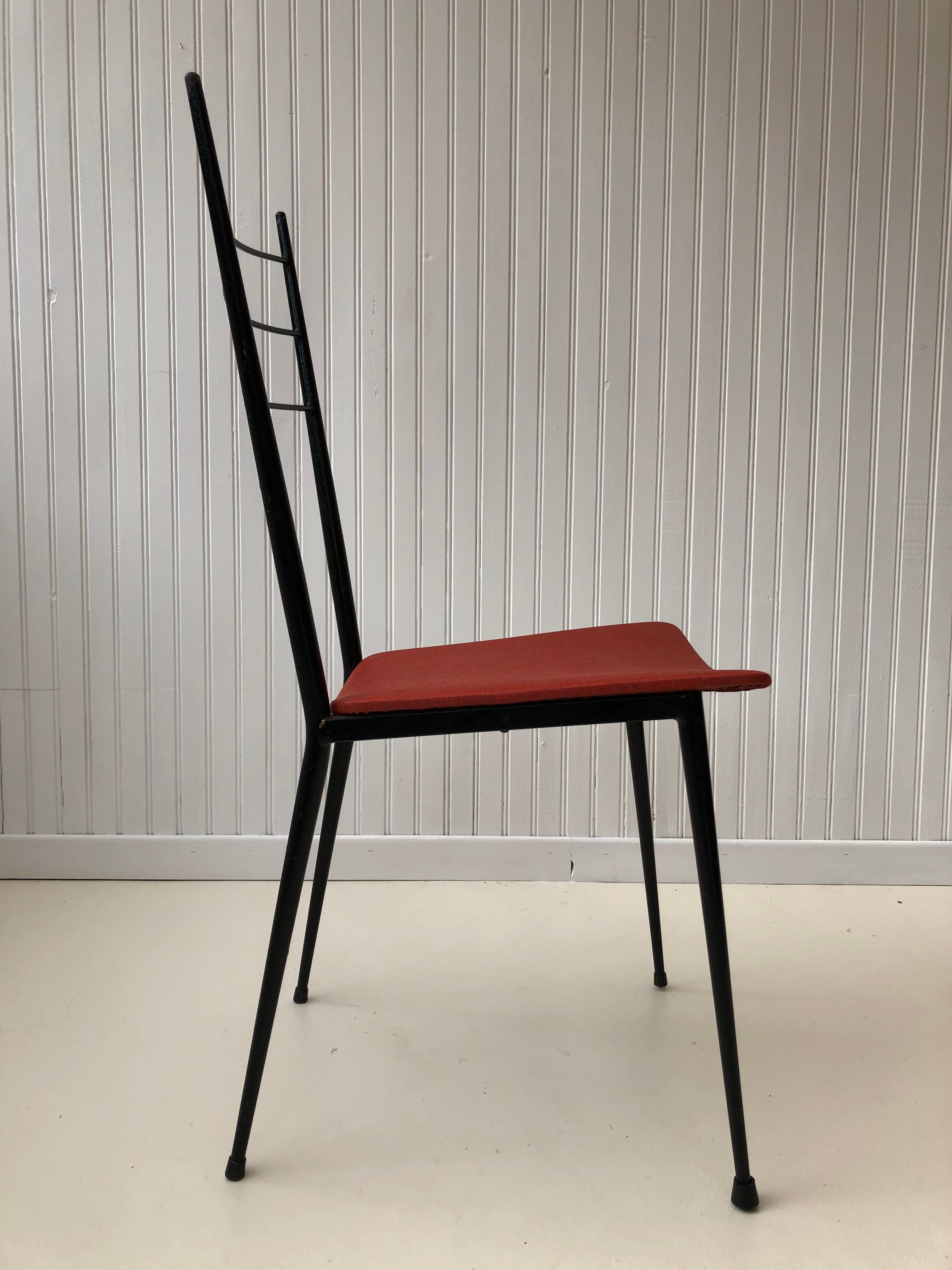 Red metal chairs from the 60s