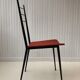 Red metal chairs from the 60s