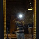 Gilded stucco mirror with gold leaf, H 152 cm