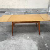 Dining table with oak compass legs