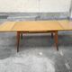 Dining table with oak compass legs