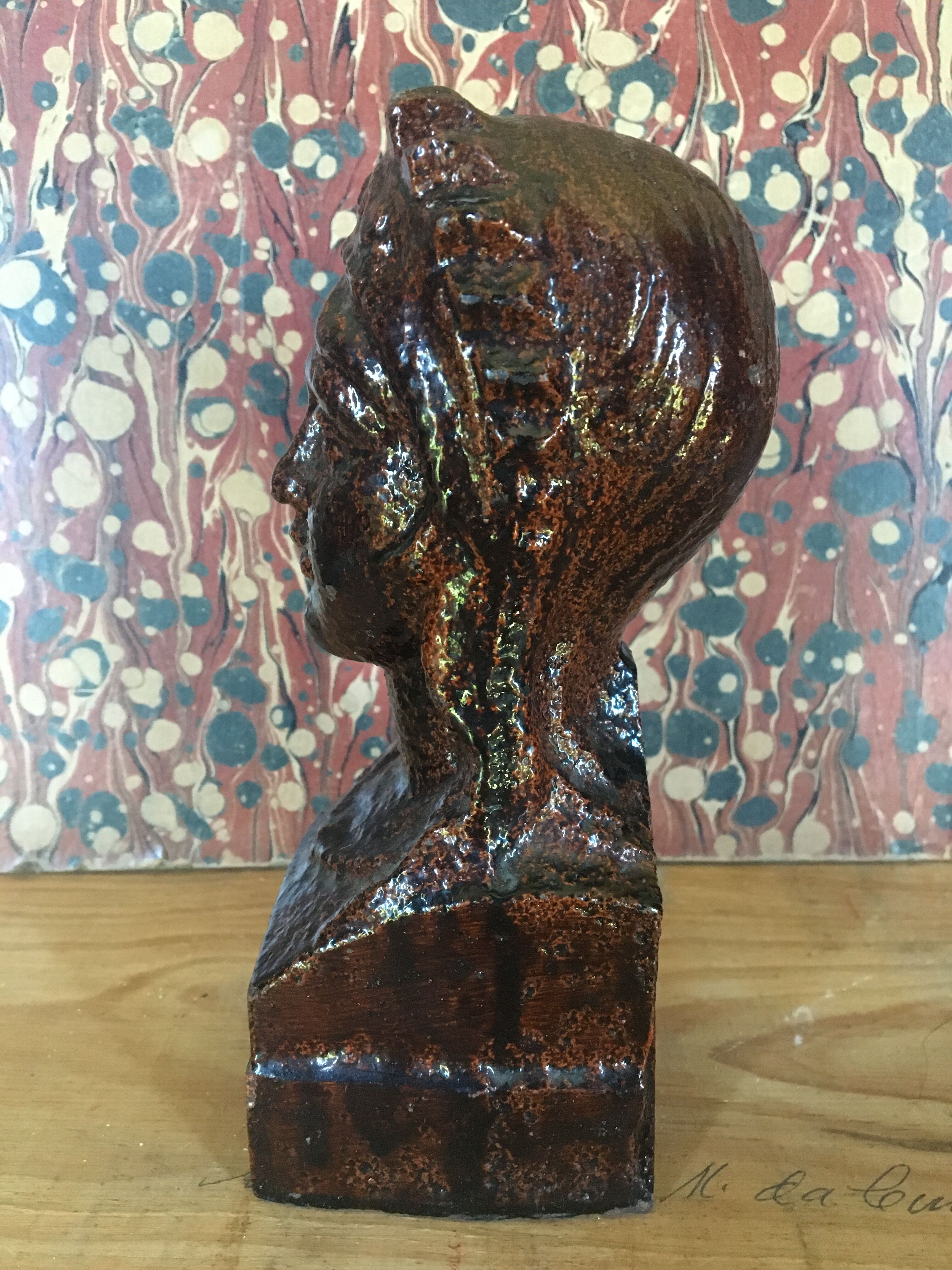 Glazed cast iron bust