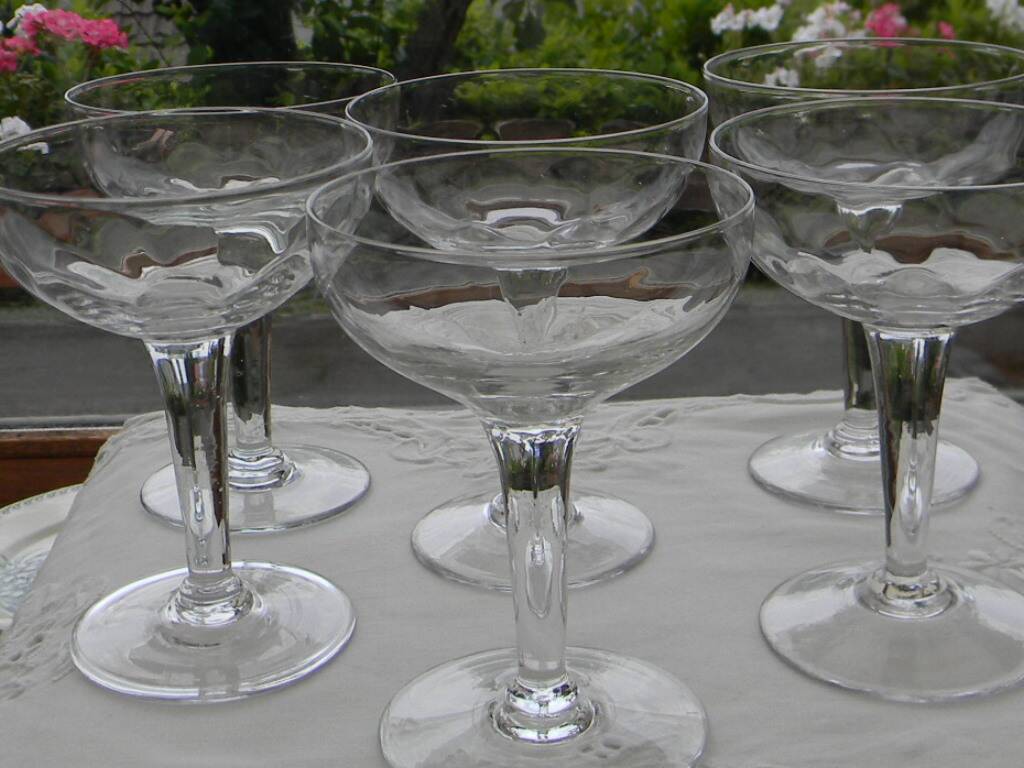 Set of 6 antique glass champagne glasses.