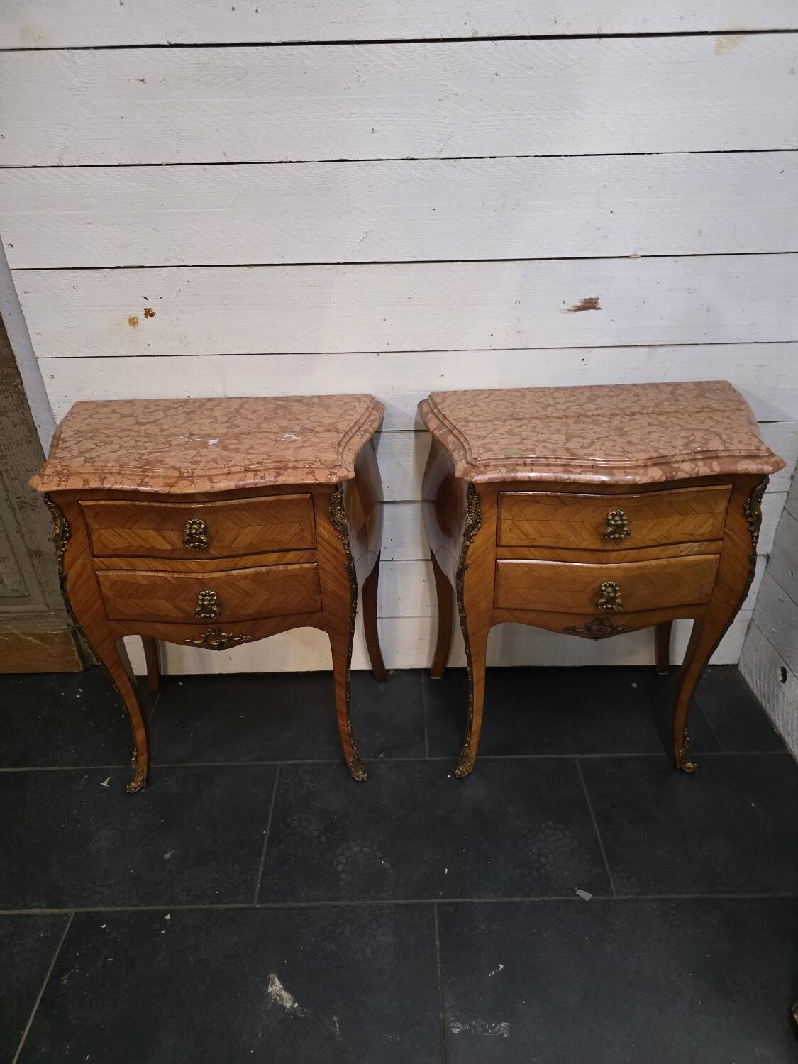 Pair of Louis XV style curved bedside tables in marquetry