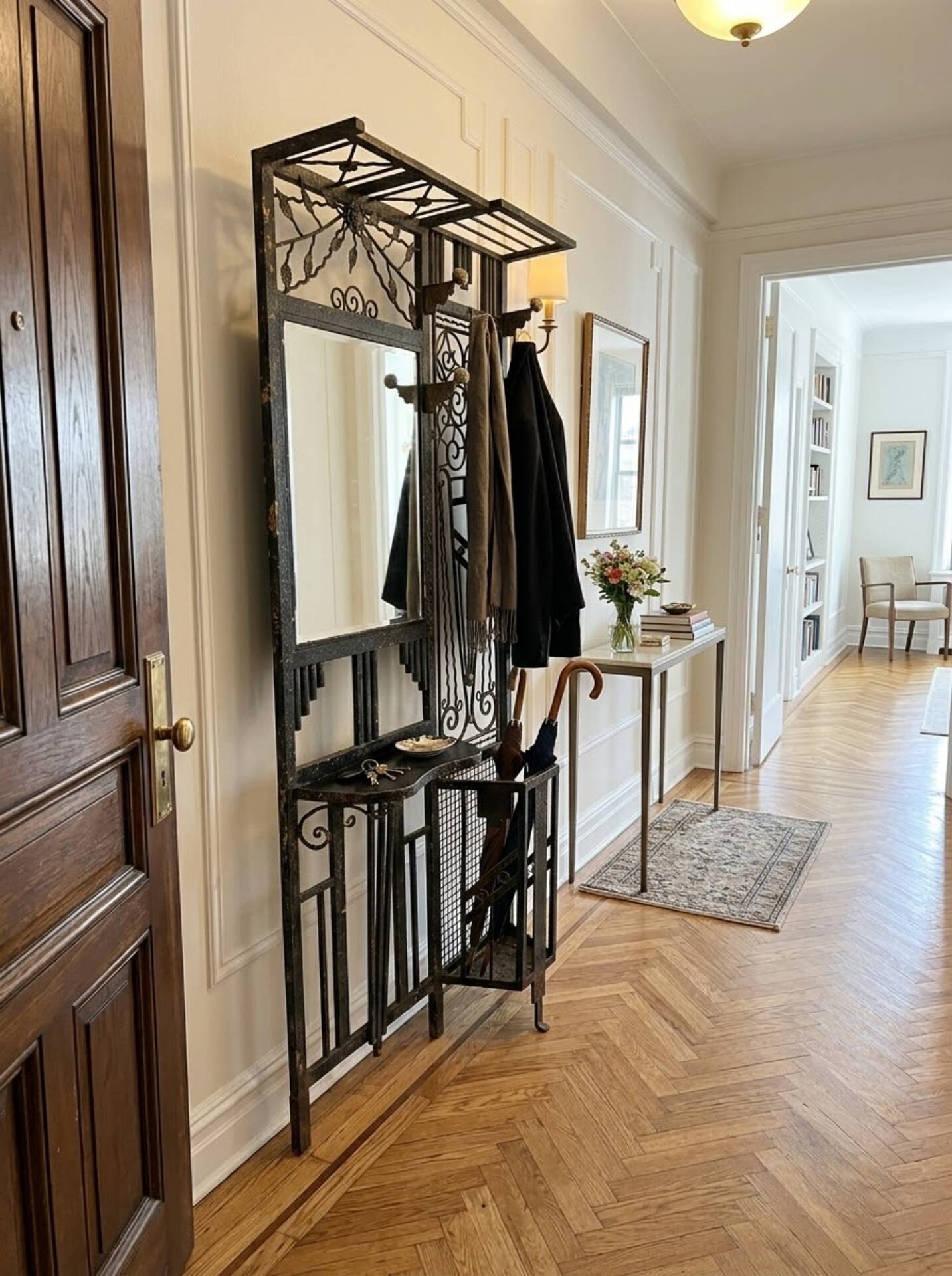 Art Deco coat rack wardrobe in wrought iron from the 1930s.