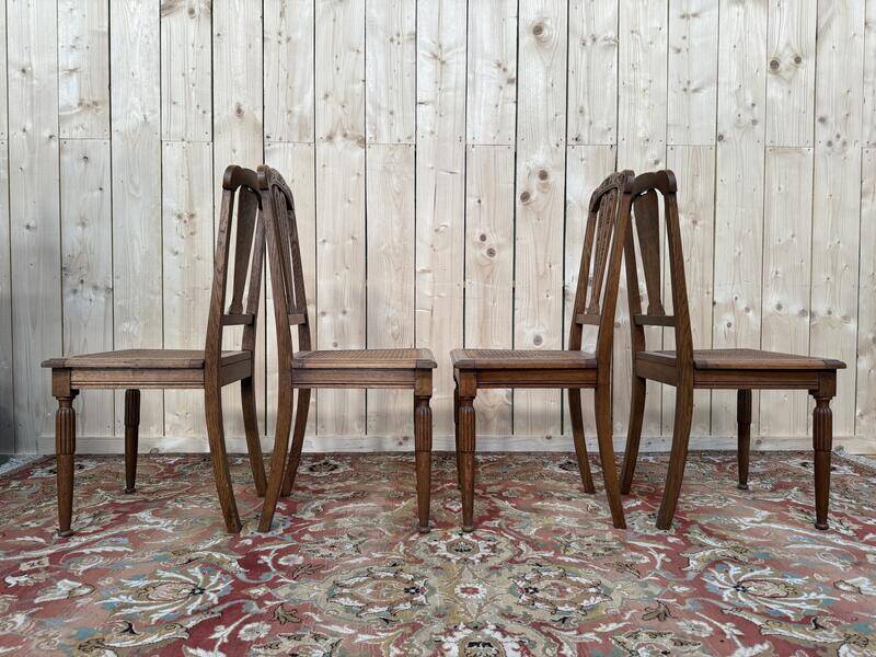 Suite de 4 chaises époque Art Déco en cannage