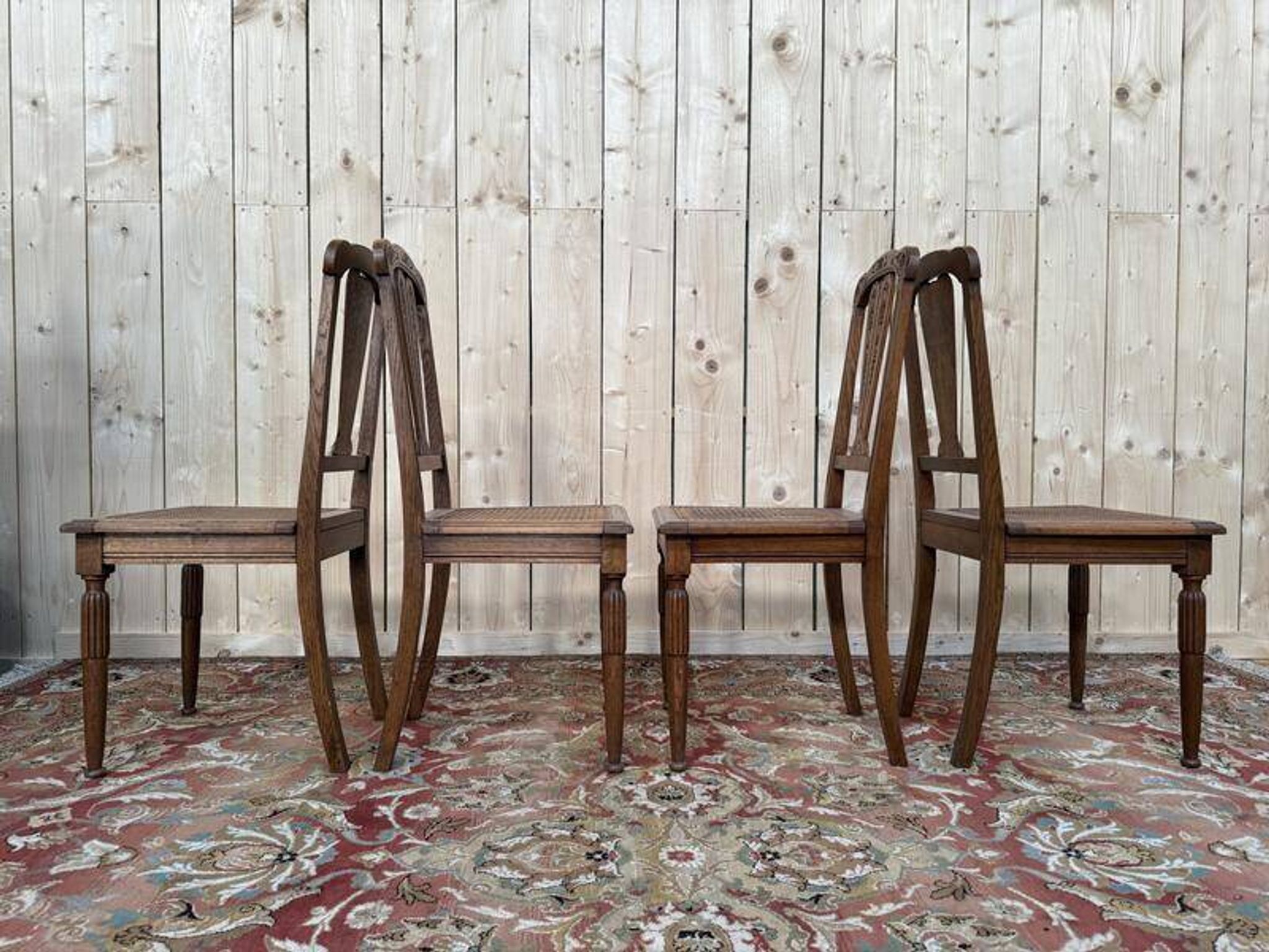 Suite de 4 chaises époque Art Déco en cannage
