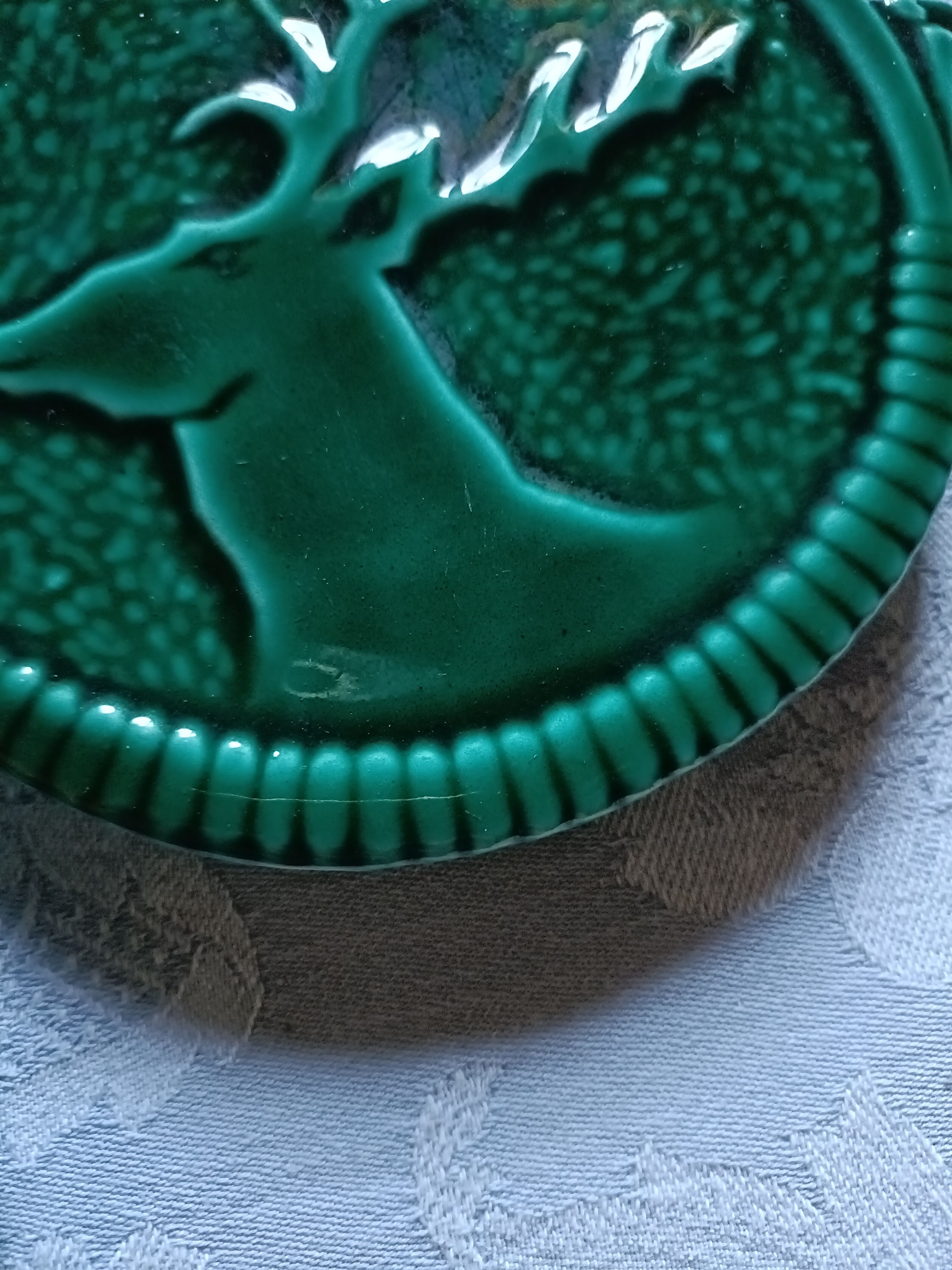 Green barbotine bottle coasters from Vallauris