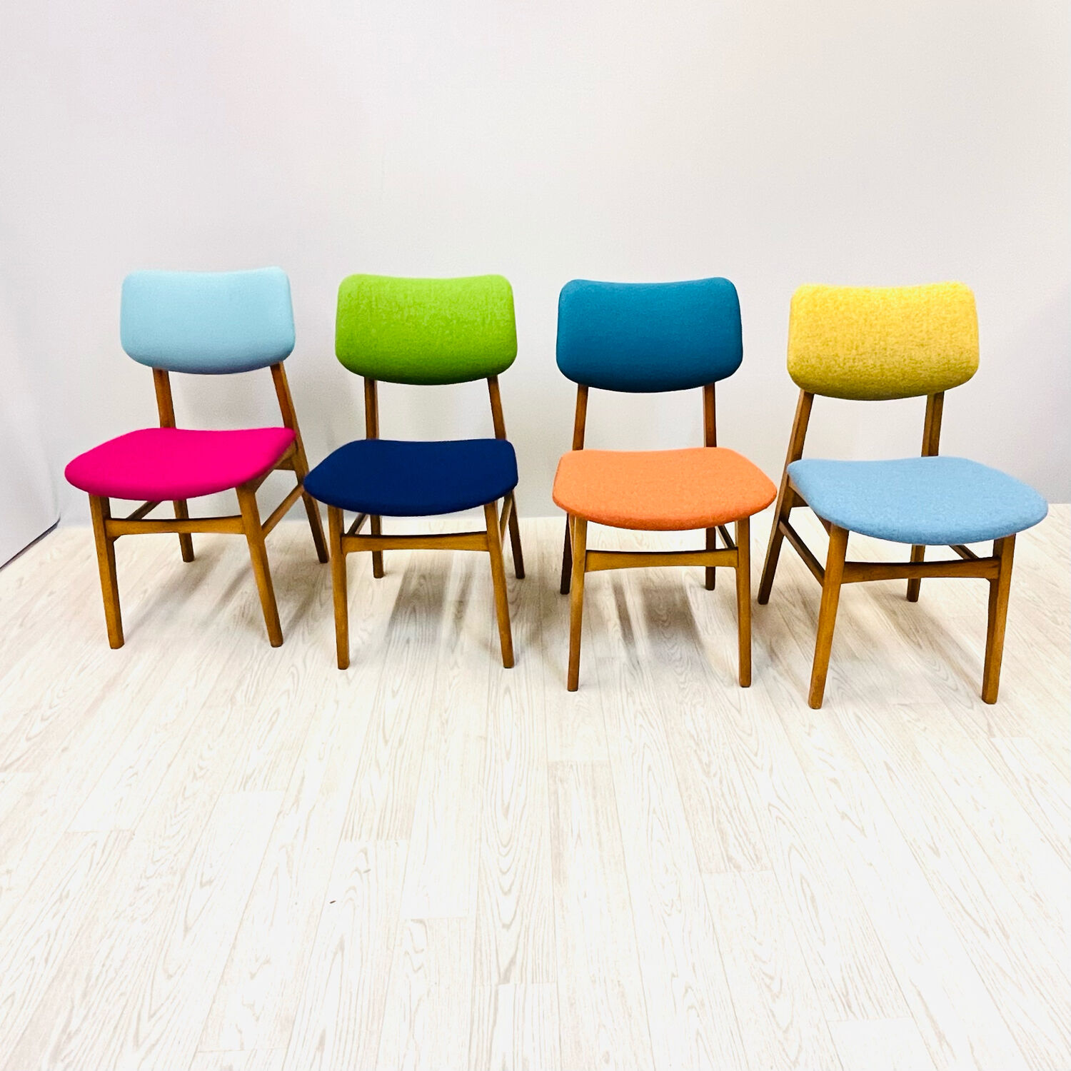 Four middle century chairs