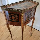 Louis XV bedside table or gueridon with floral motifs, 19th century.