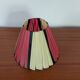 Pleated red and pale yellow plastic conical lampshade from the 1960s.