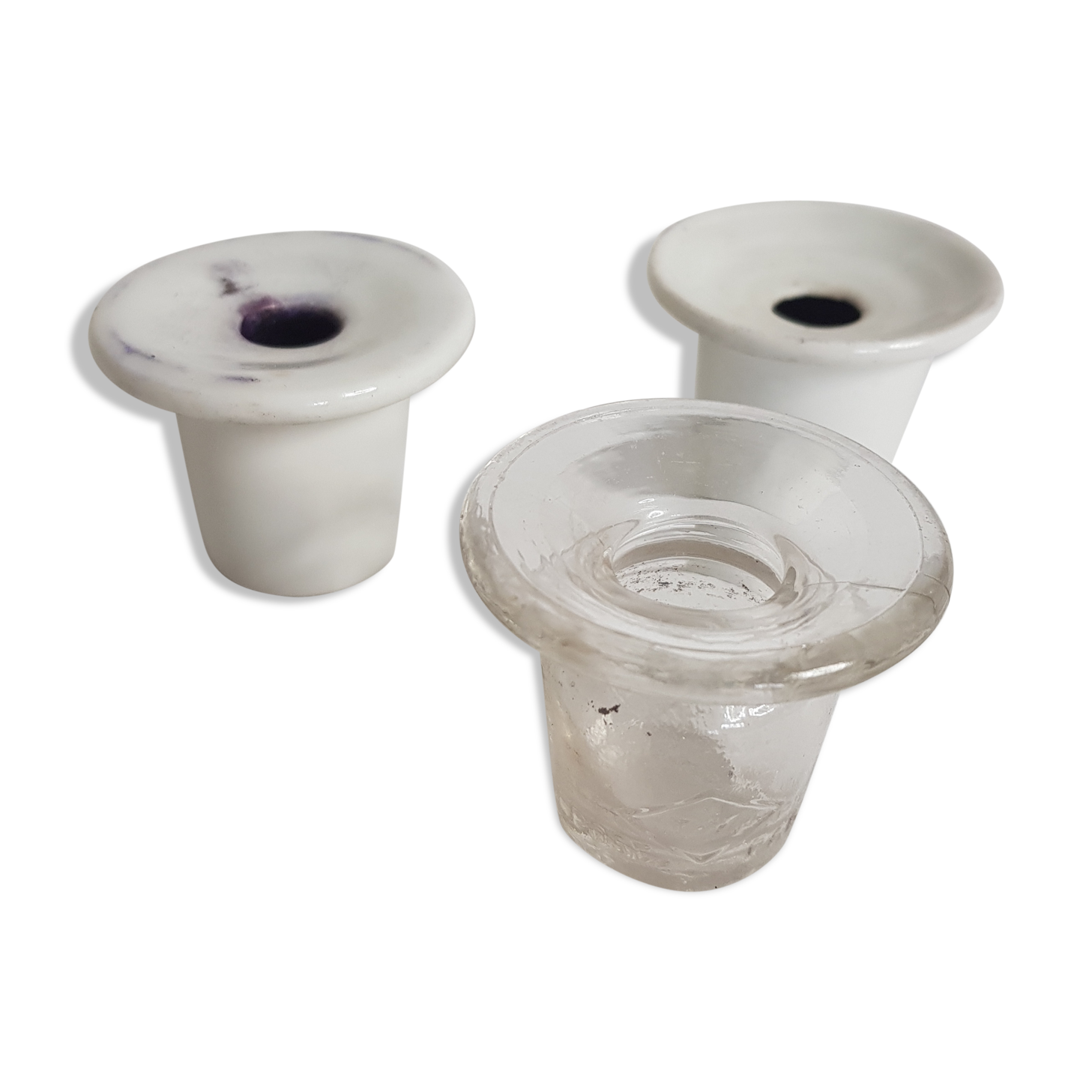Three white porcelain and glass inkwells for school desk
