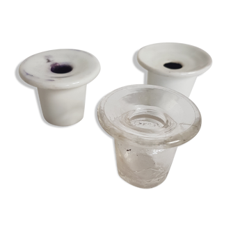 Three white porcelain and glass inkwells for school desk