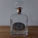 Glass and tin whiskey decanter