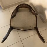 Old wooden armchair and cannage