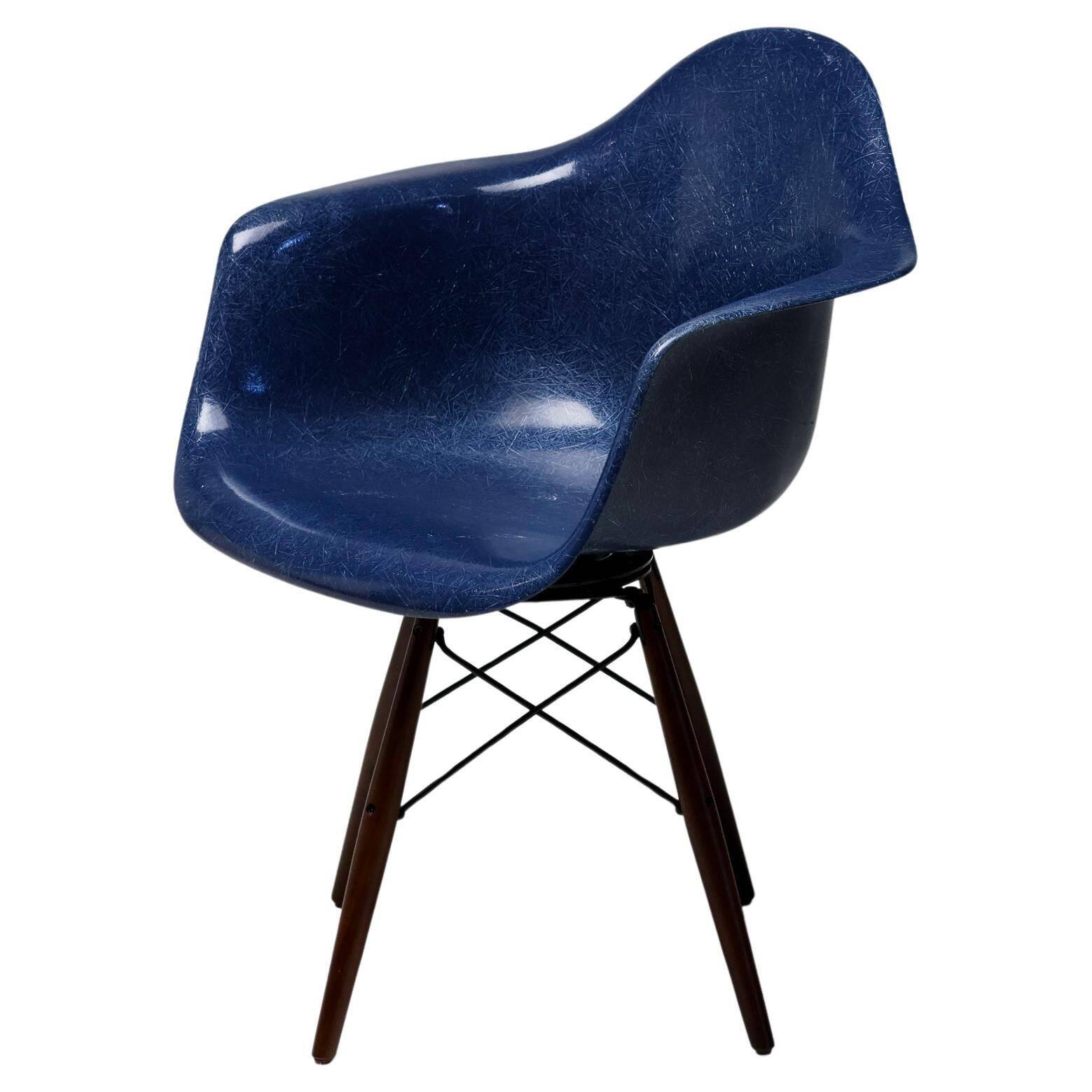 Indigo blue Charles Eames "PAW" armchair by Herman Miller, mid-century modern.