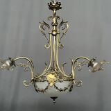 Lustre de style Louis XV. Bronze massif, cristal.