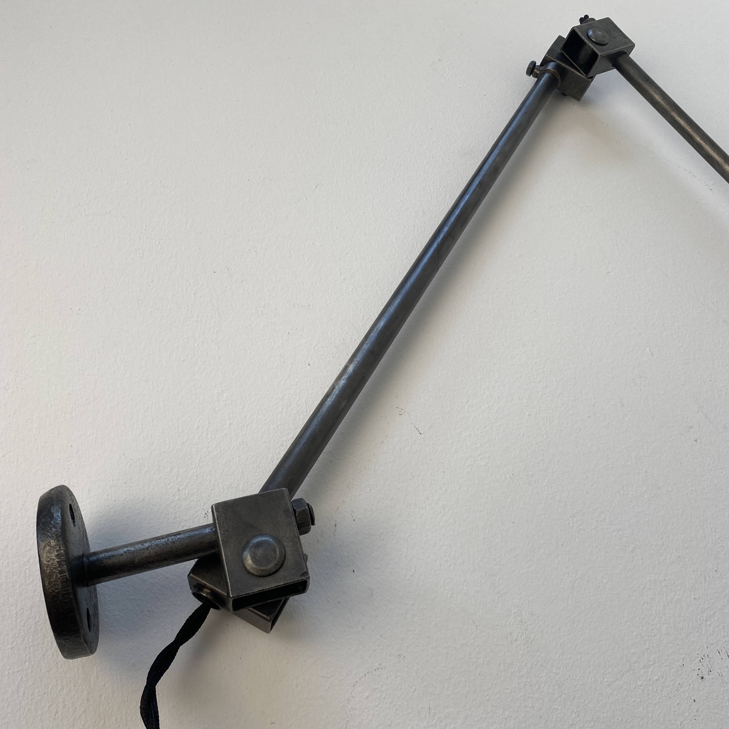 Vintage industrial workshop wall light from the 1950s.