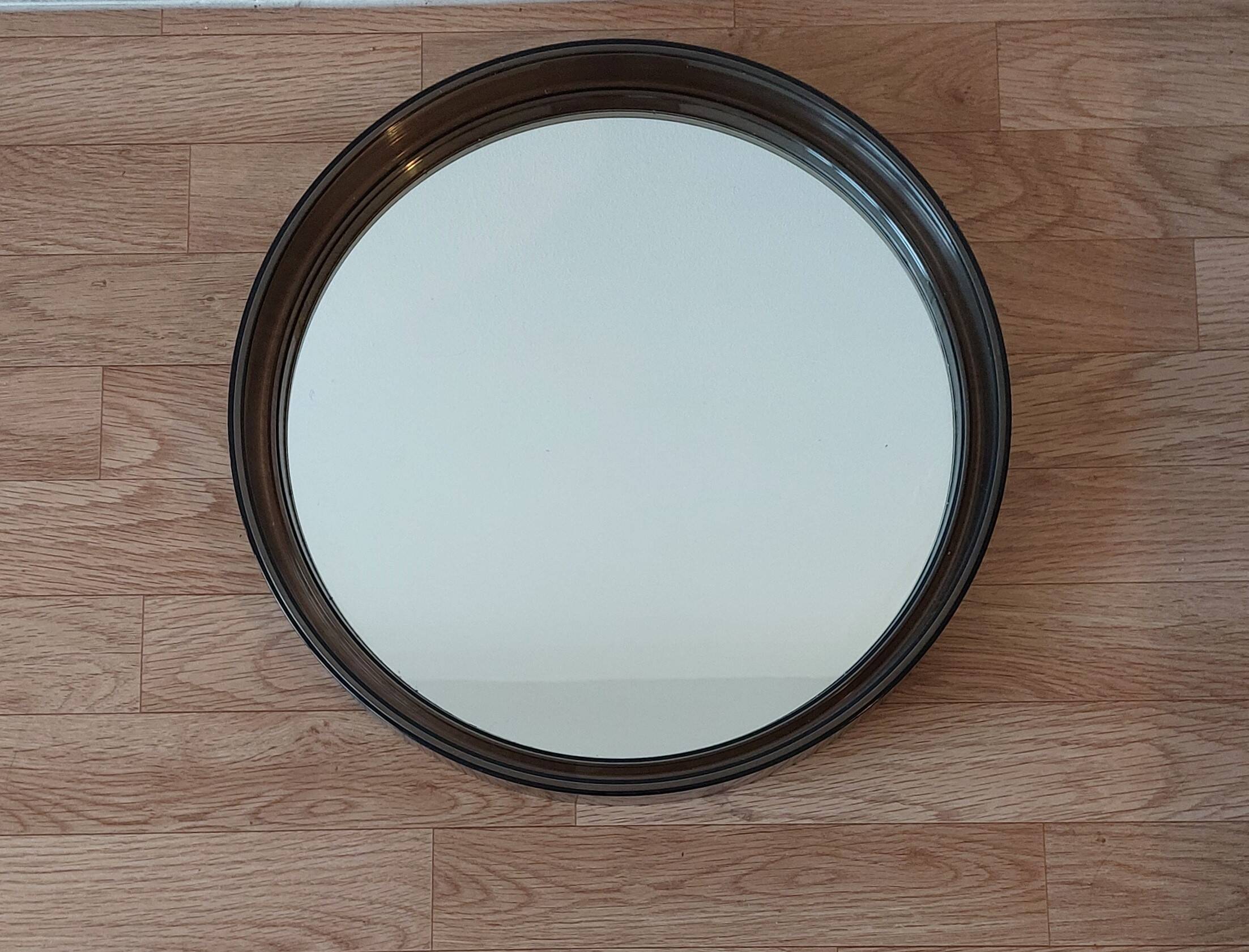 Round smoked plastic mirror 1970 Vintage.