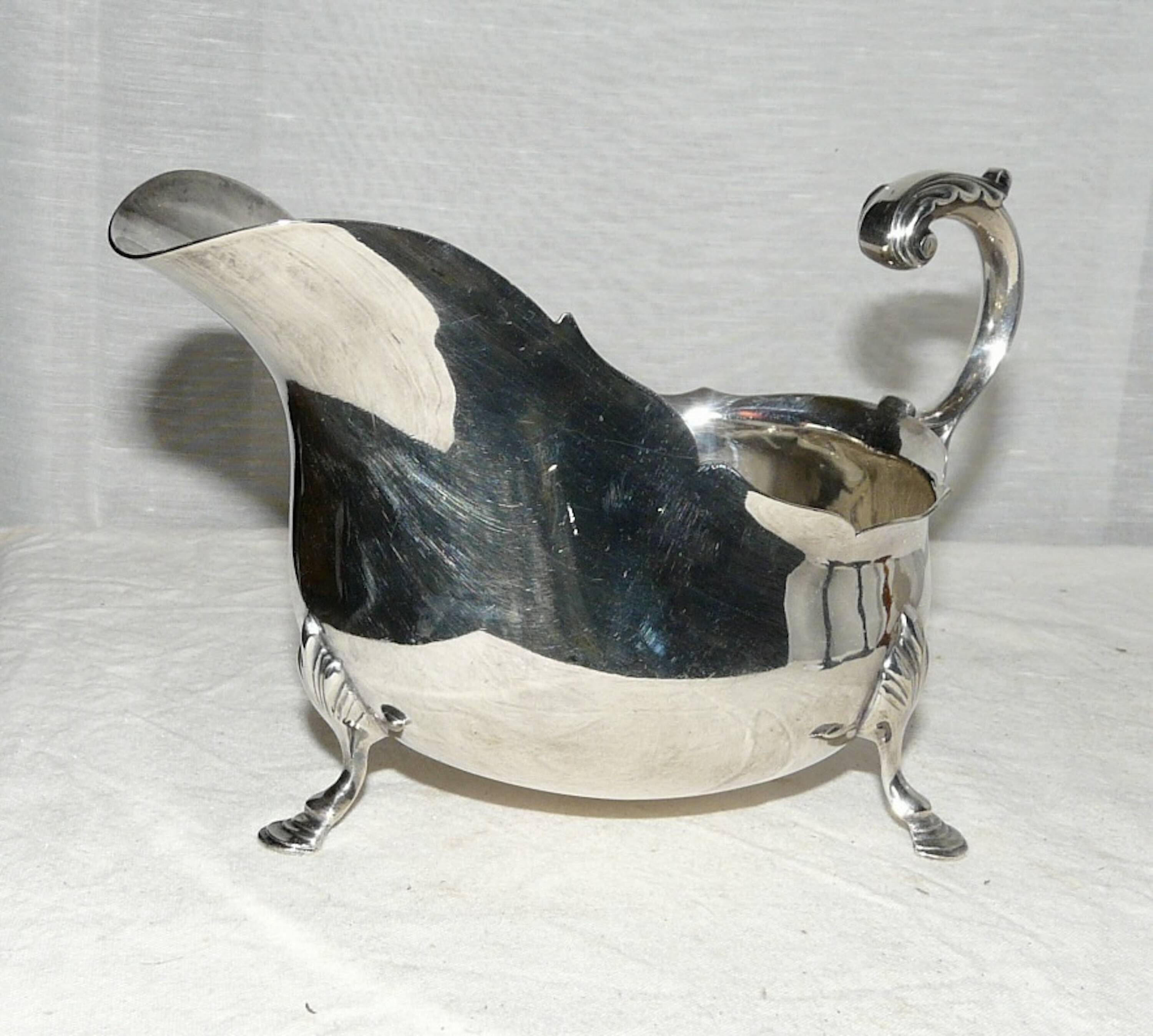 Empire style silver metal sauce boat