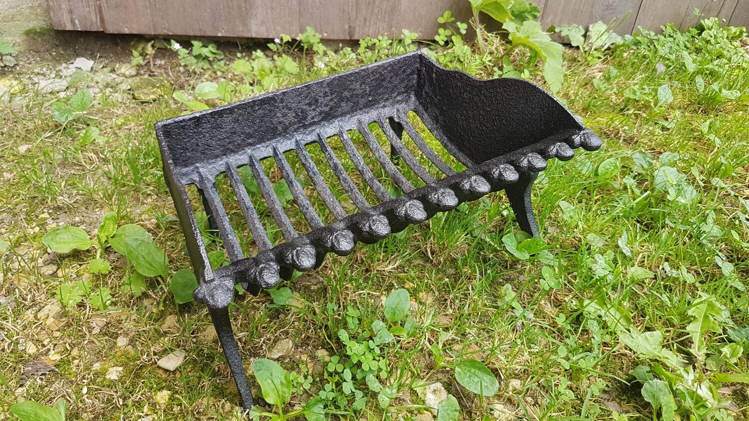 Old vintage black cast iron fireplace