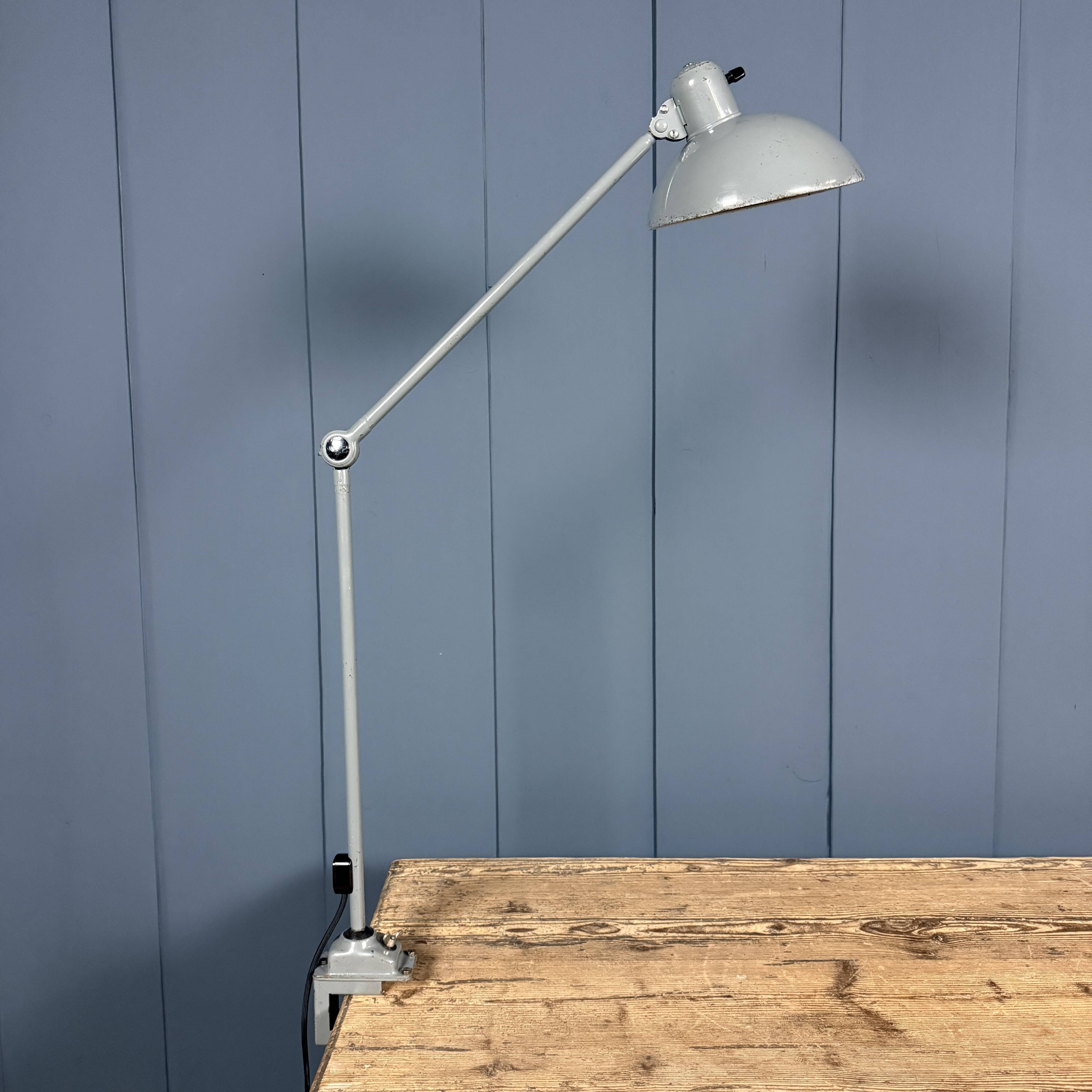 Grey two-arm Kaiser Idell clamp lamp model