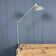 Lampe de bureau Kaiser Idell à pince grise à deux bras modèle