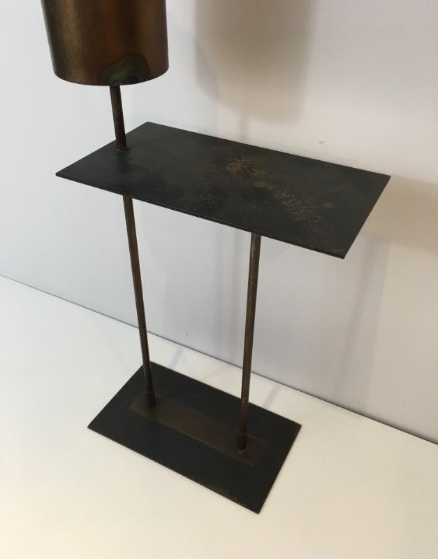 Modernist ashtray in black lacquered metal and brass