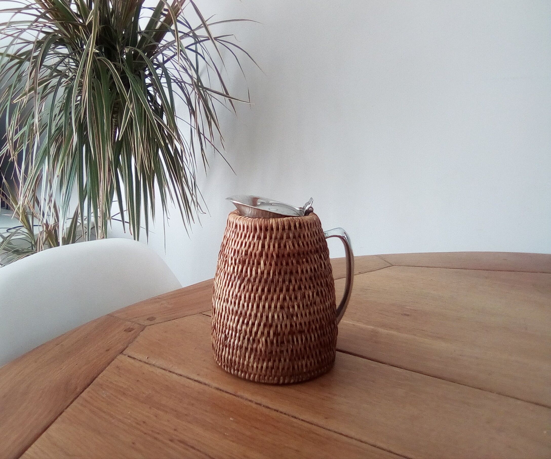 1980s rattan stainless steel pitcher