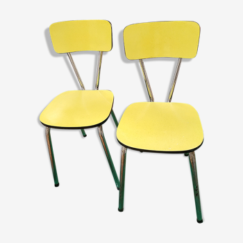 Pair of yellow formica chairs